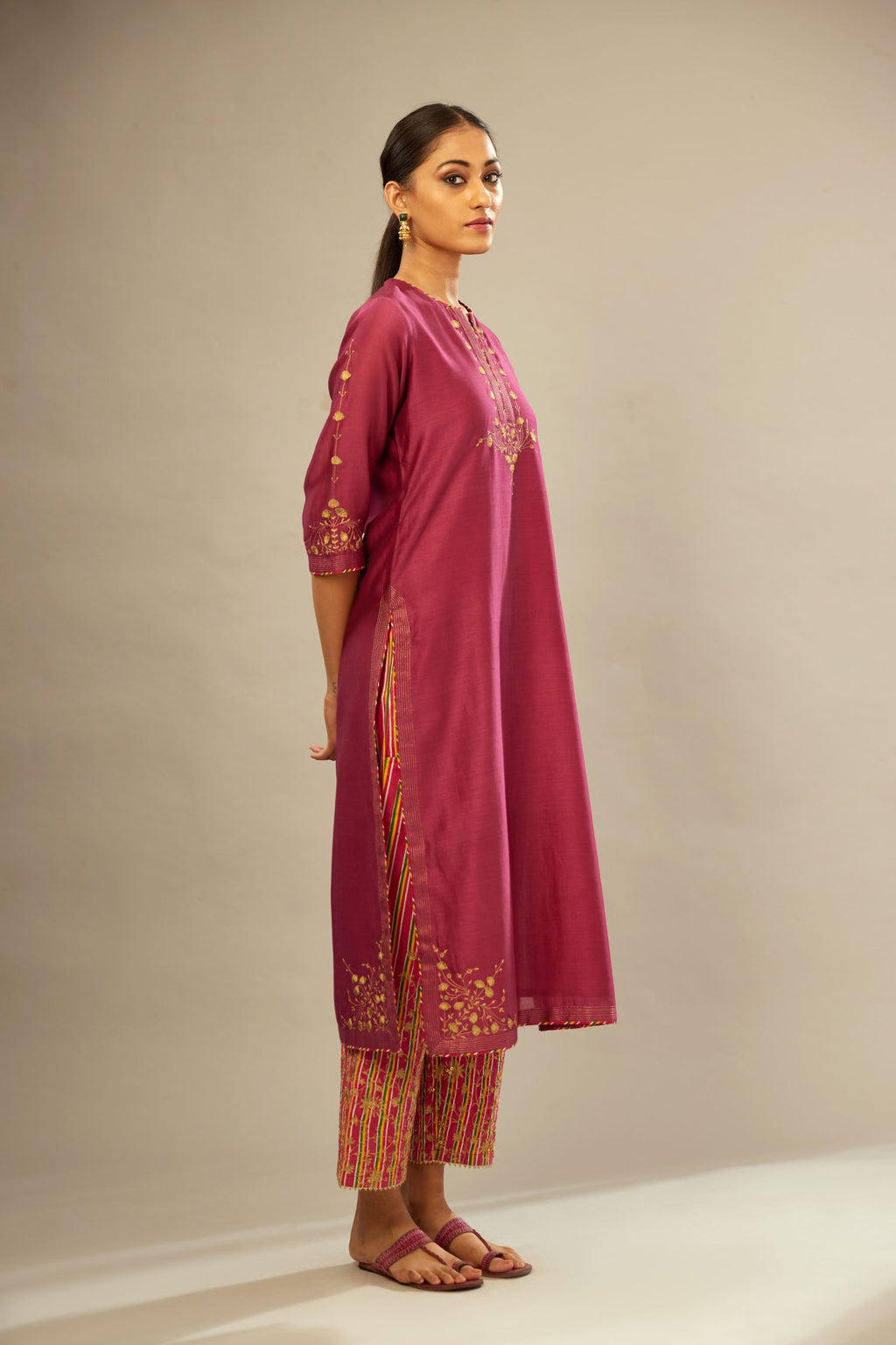 Deep wine silk Chanderi kurta set with zari embroidery, highlighted with goldenr zari quilting
