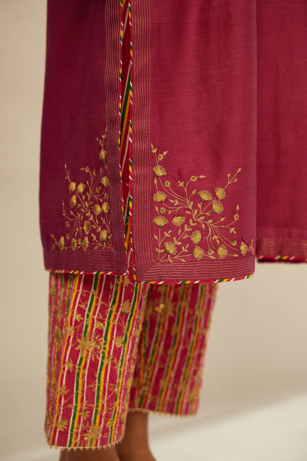 Deep wine silk Chanderi kurta set with zari embroidery, highlighted with goldenr zari quilting