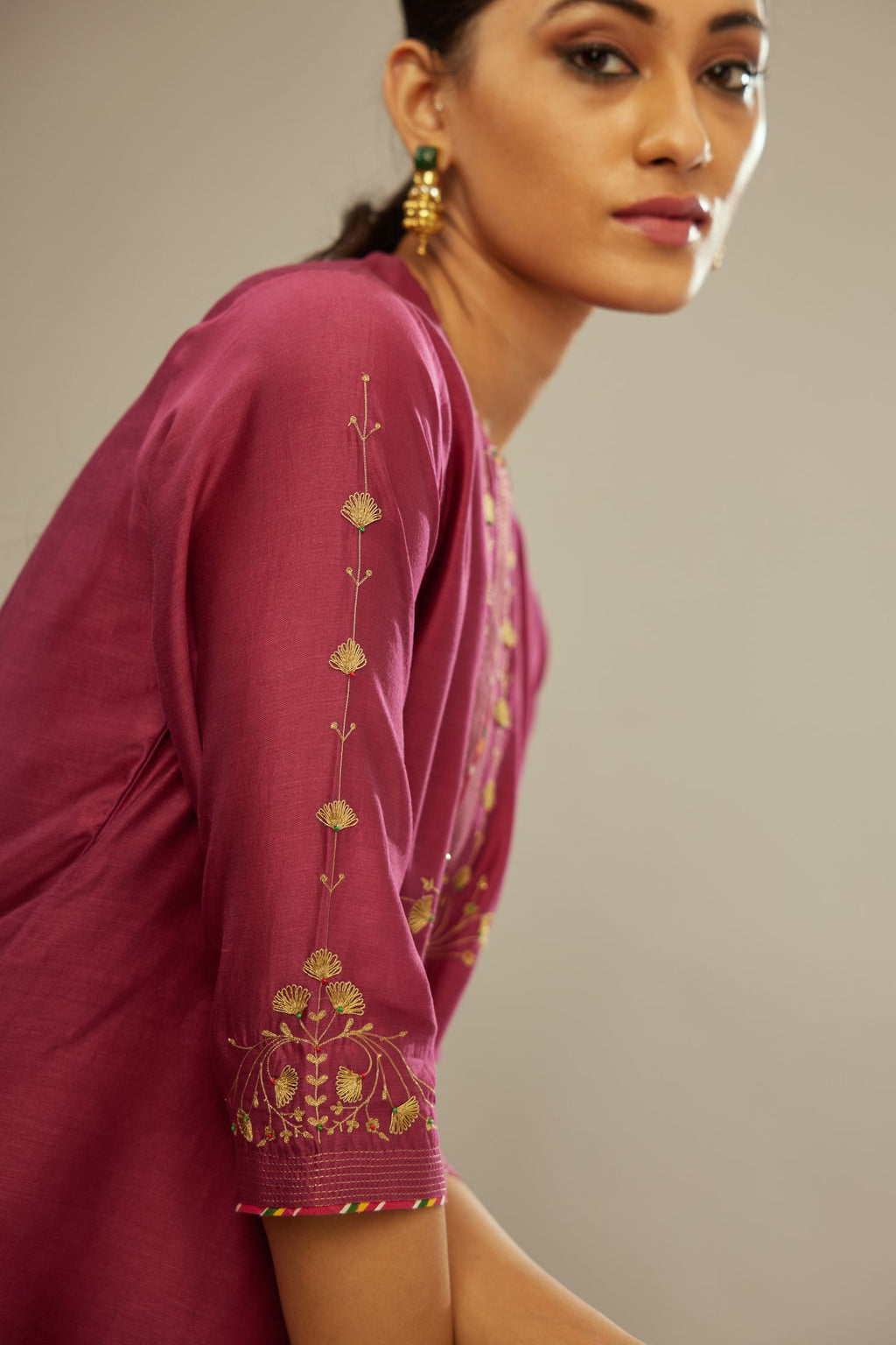 Deep wine silk Chanderi kurta set with zari embroidery, highlighted with goldenr zari quilting