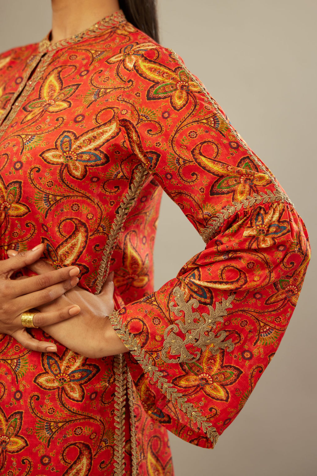 Burnt orange digital printed dori embroidered silk kurta set, highlighted with gold sequin handwork.