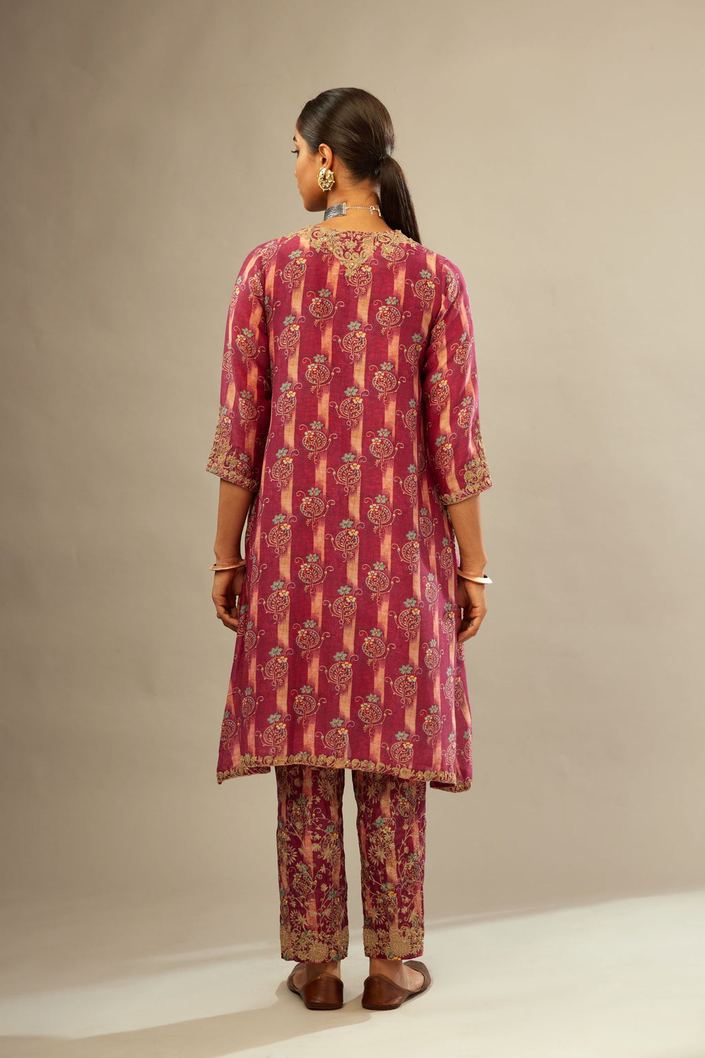 Deep wine digital printed dori embroidered fine silk A-line short kurta set with jacket and straight hem, side pockets, highlighted with gold sequin hand work.