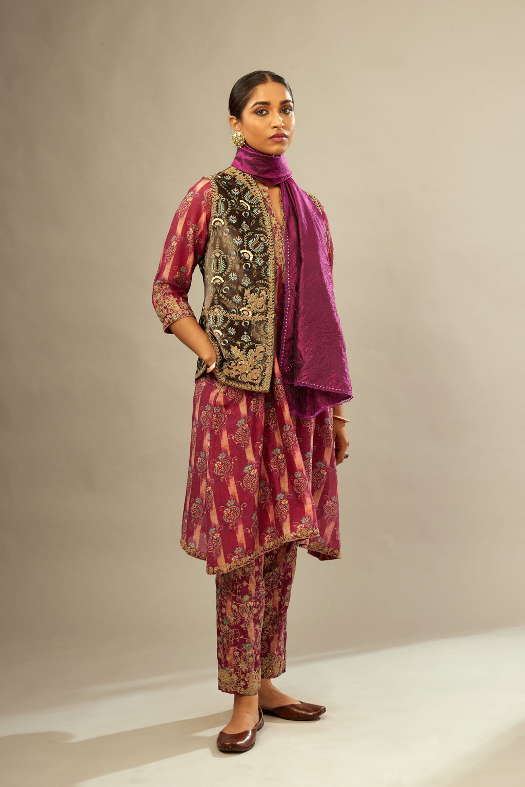 Deep wine digital printed dori embroidered fine silk A-line short kurta set with jacket and straight hem, side pockets, highlighted with gold sequin hand work.