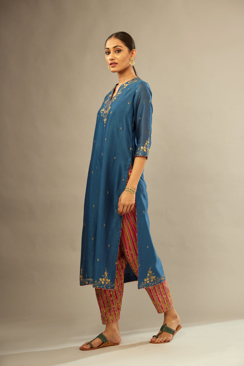 Silk Chanderi straight kurta set detailed with golden zari embroidery