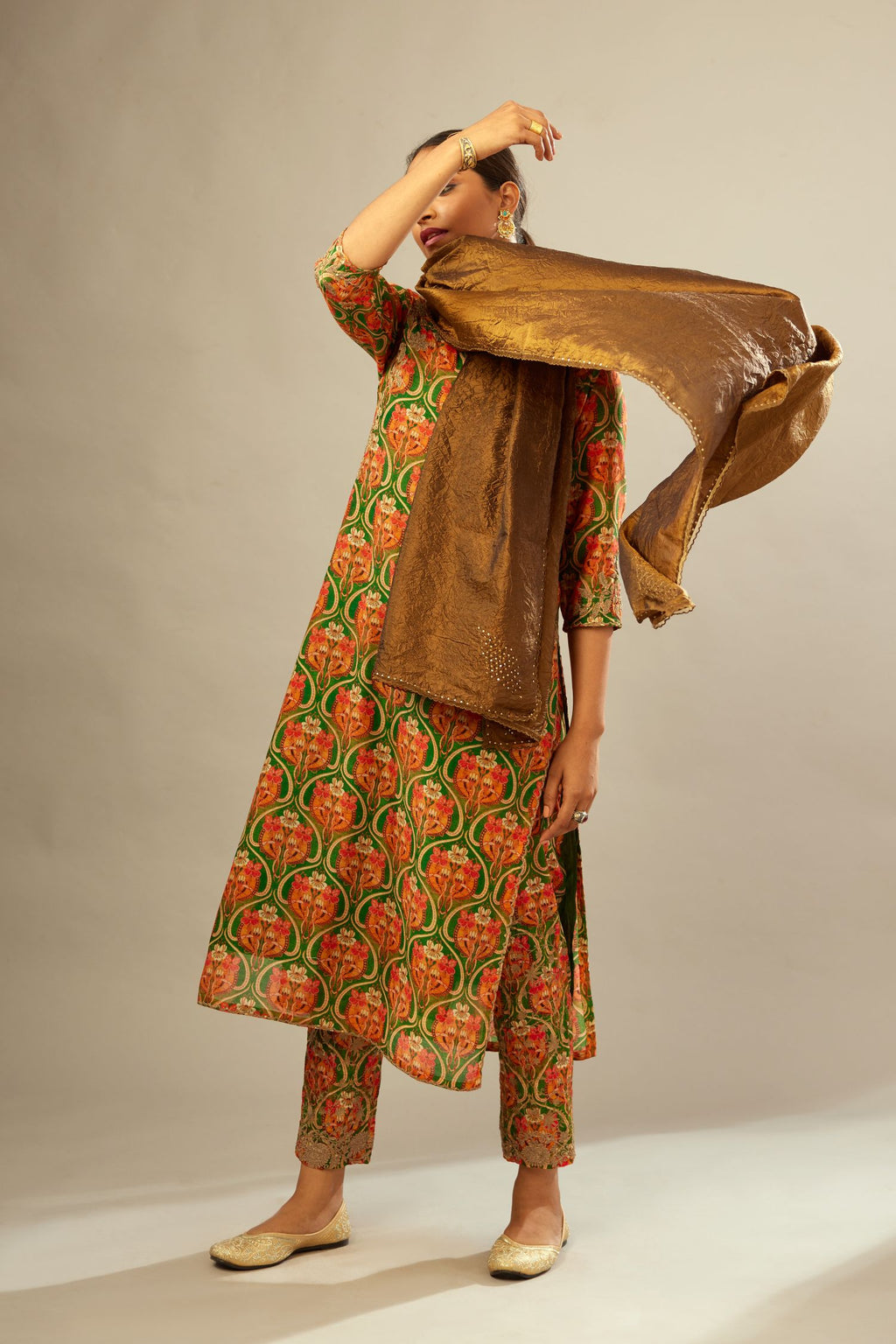 Green and orange digital printed silk straight kurta set, highlighted with gold dori embroidery, highlighted with gold sequin hand work.
