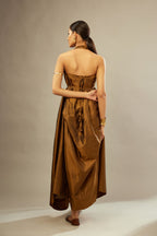 Golden olive silk long free size dress with asymmetric hem and side pockets, paired with navy blue silk velvet short jacket with light gold dori embroidery all-over the jacket.
