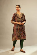 Maroon A-line silk velvet fully jaal embroidered kurta set, detailed with golden dori embroidery