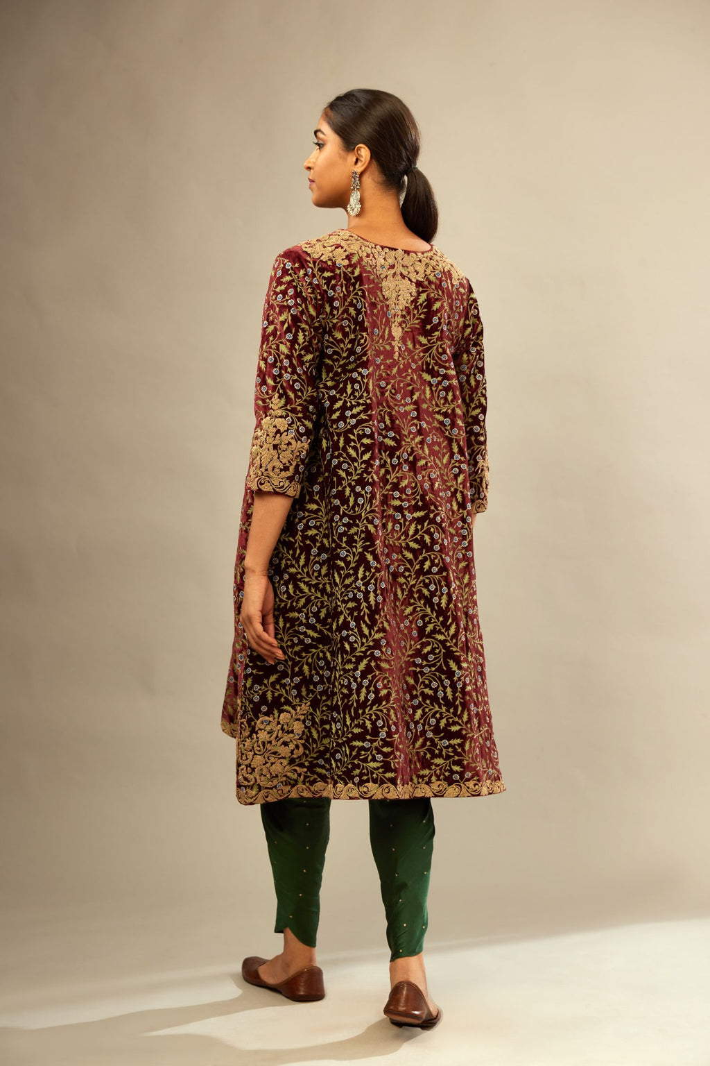 Maroon A-line silk velvet fully jaal embroidered kurta set, detailed with golden dori embroidery