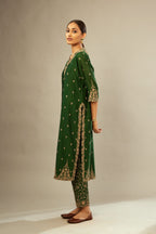 Green silk chanderi straight kurta set with gold dori embroidery, detailed with small aari embroidery buties all-over.
