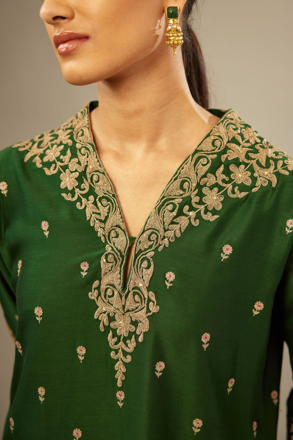 Green silk chanderi straight kurta set with gold dori embroidery, detailed with small aari embroidery buties all-over.