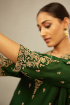 Green silk chanderi straight kurta set with gold dori embroidery, detailed with small aari embroidery buties all-over.