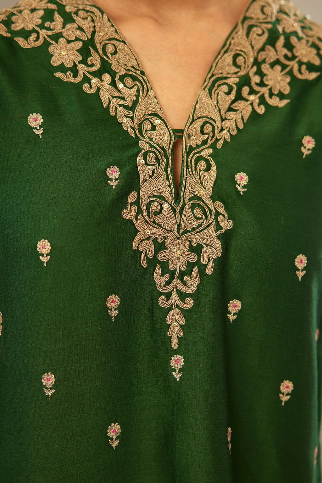 Green silk chanderi straight kurta set with gold dori embroidery, detailed with small aari embroidery buties all-over.