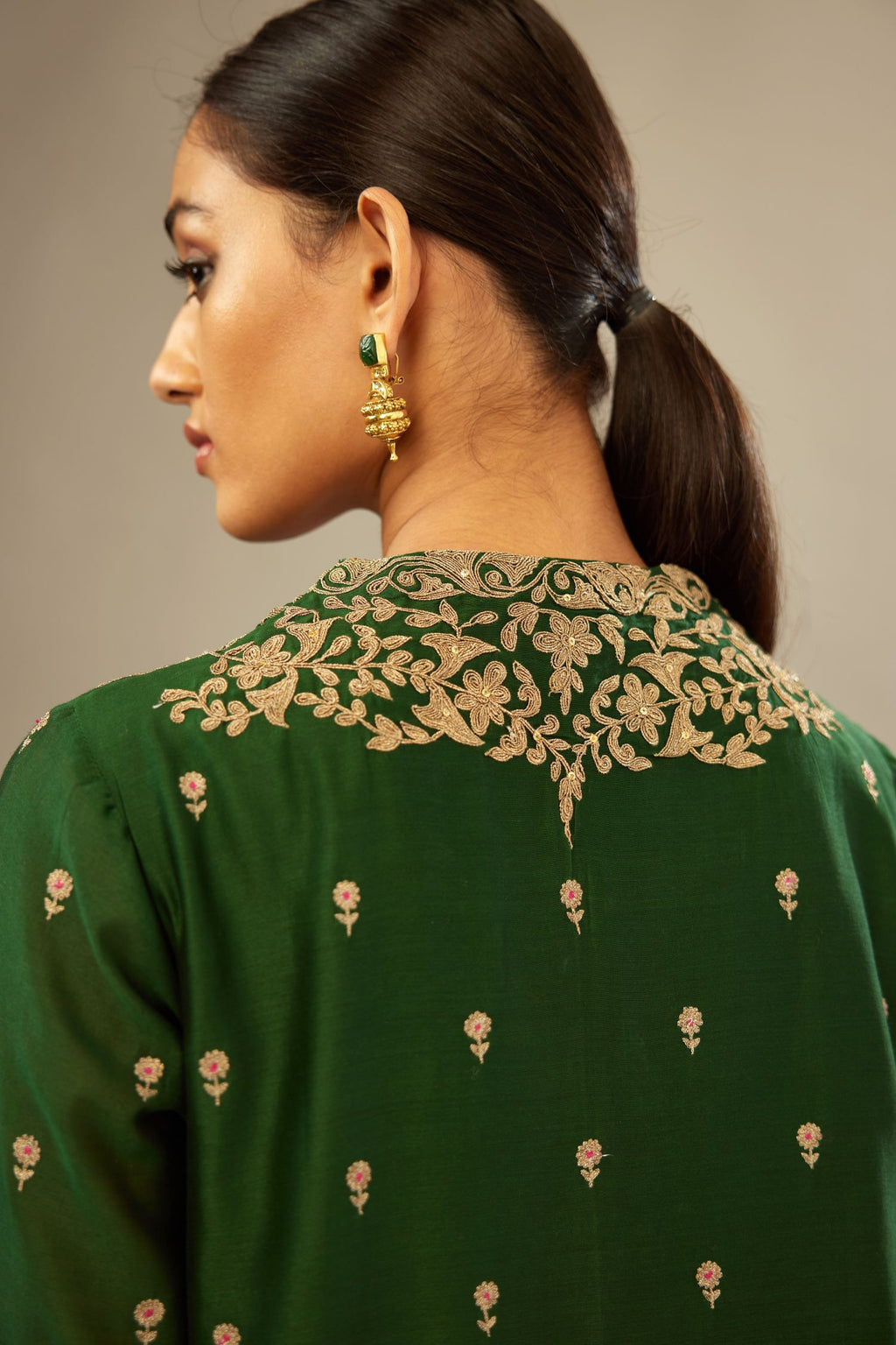 Green silk chanderi straight kurta set with gold dori embroidery, detailed with small aari embroidery buties all-over.