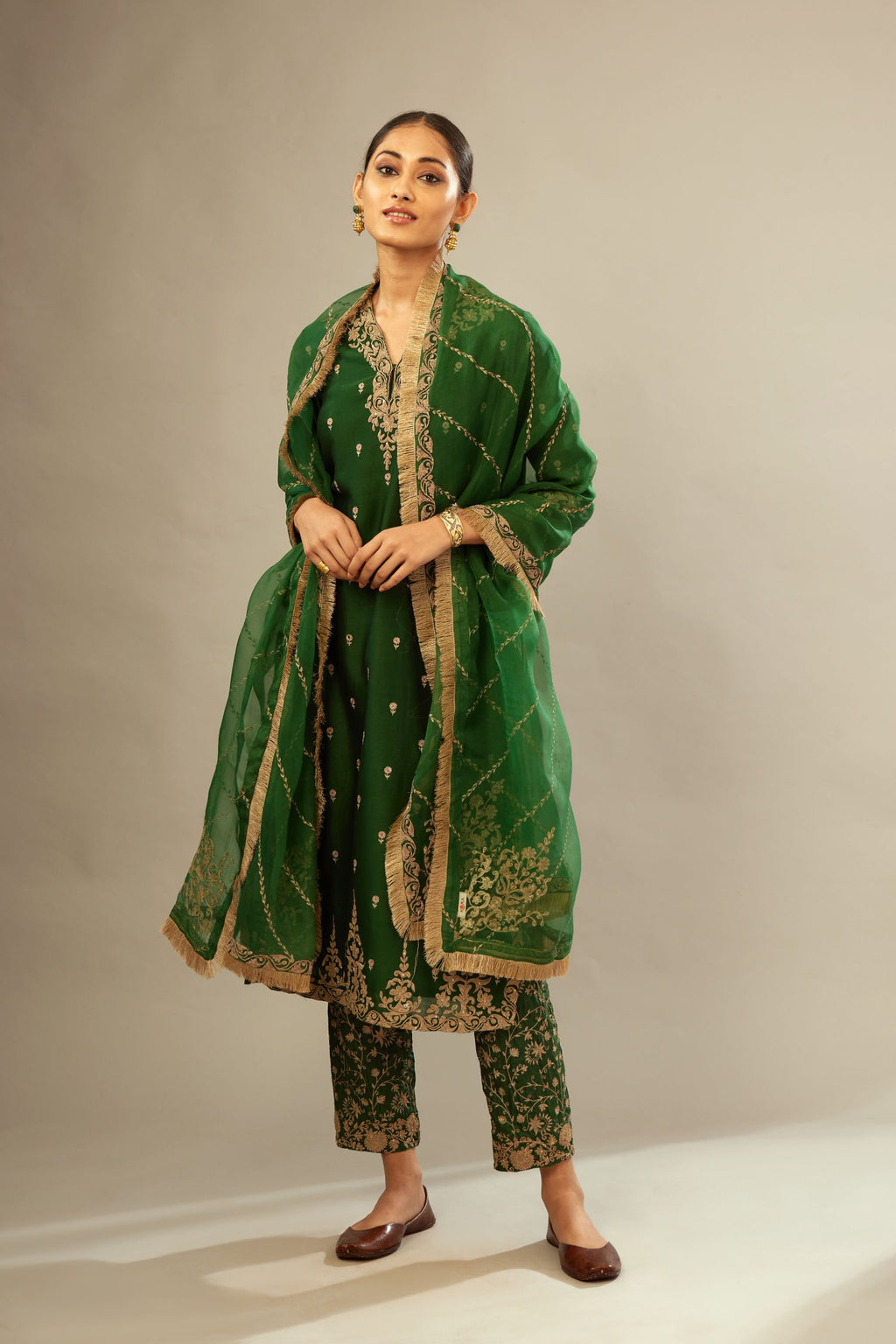 Green silk chanderi straight kurta set with gold dori embroidery, detailed with small aari embroidery buties all-over.