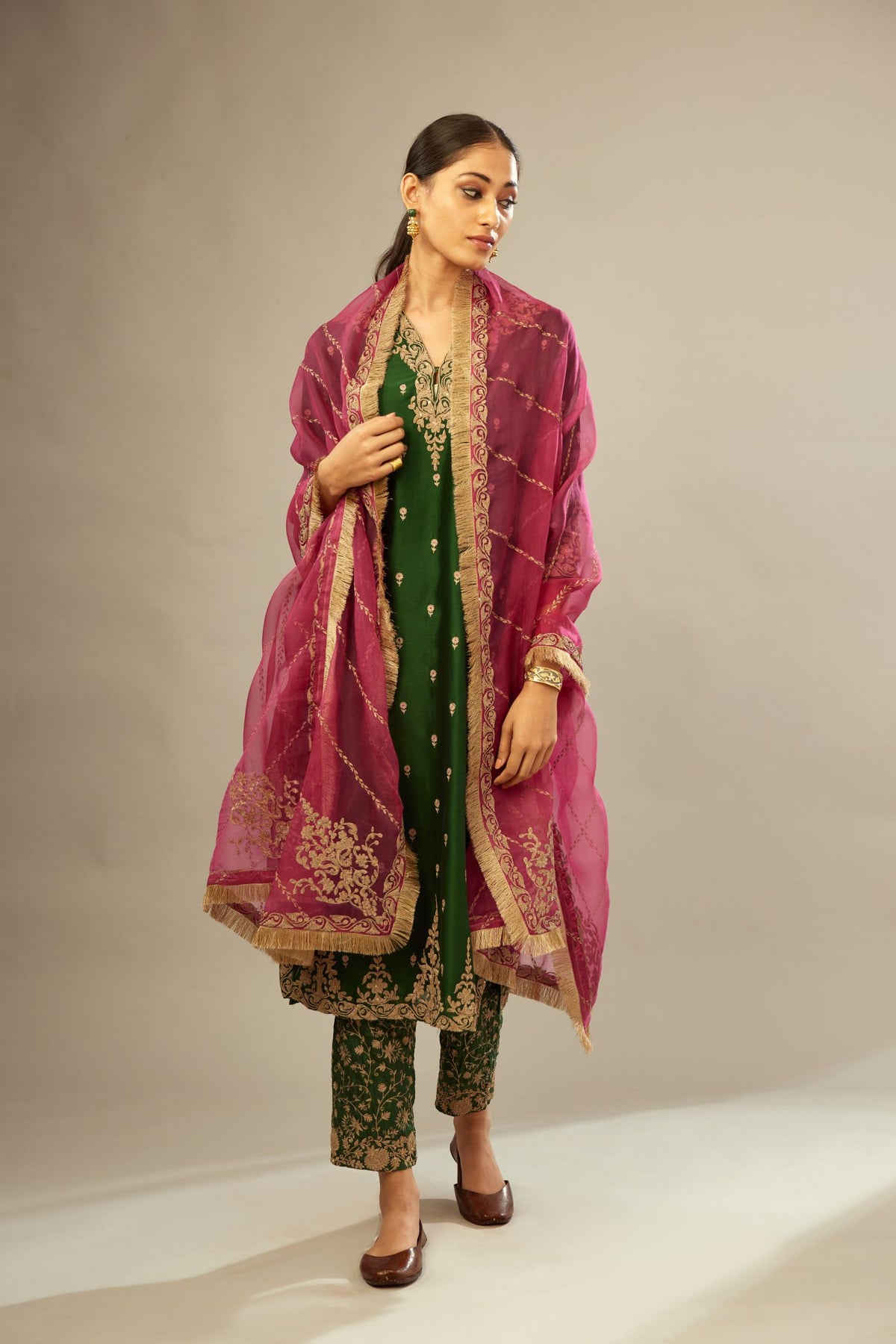 Green silk chanderi straight kurta set with gold dori embroidery, detailed with small aari embroidery buties all-over.