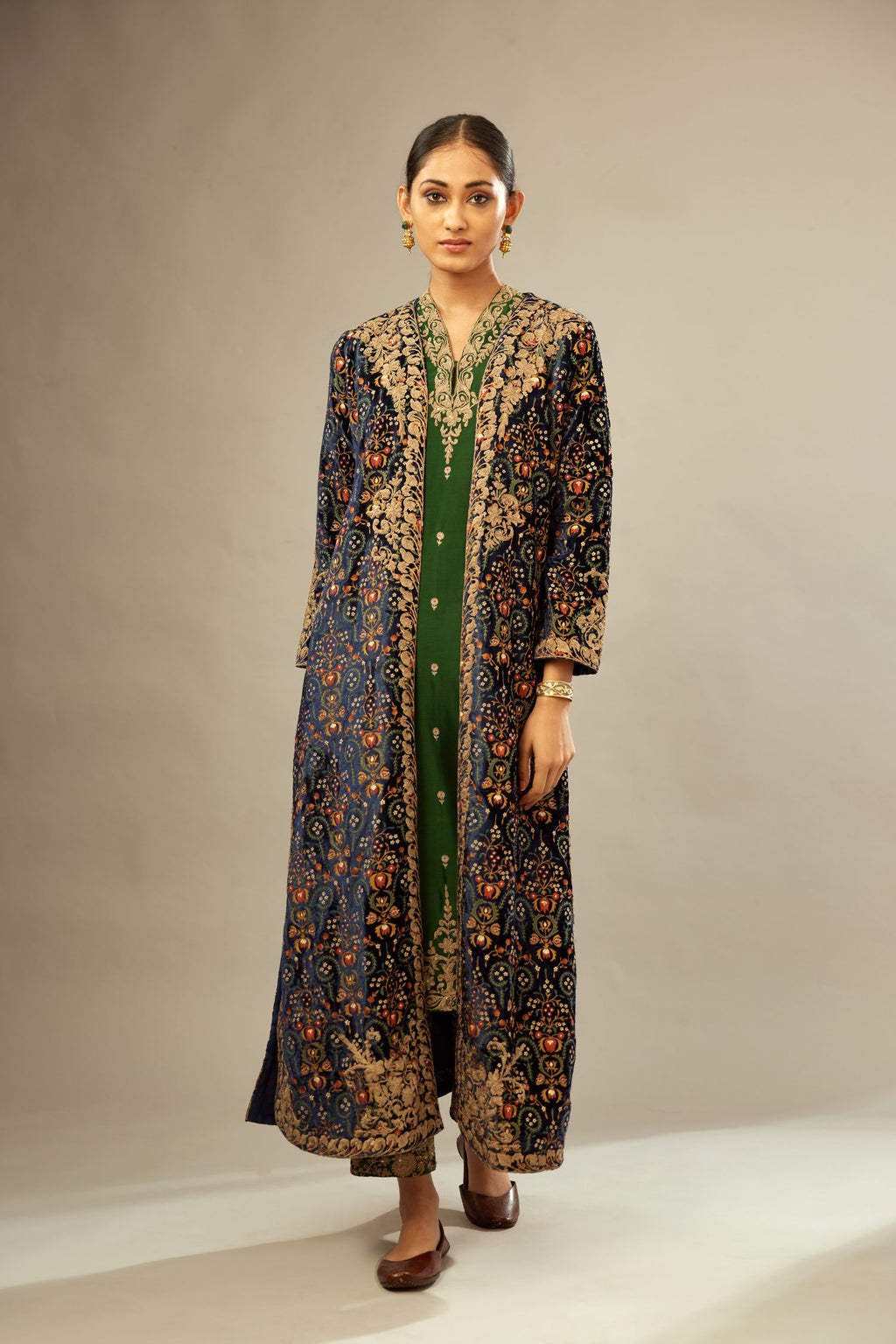 Navy blue silk velvet ankle length front open jacket with fully silk thread jaal embroidery and detailed with light gold dori embroidery.