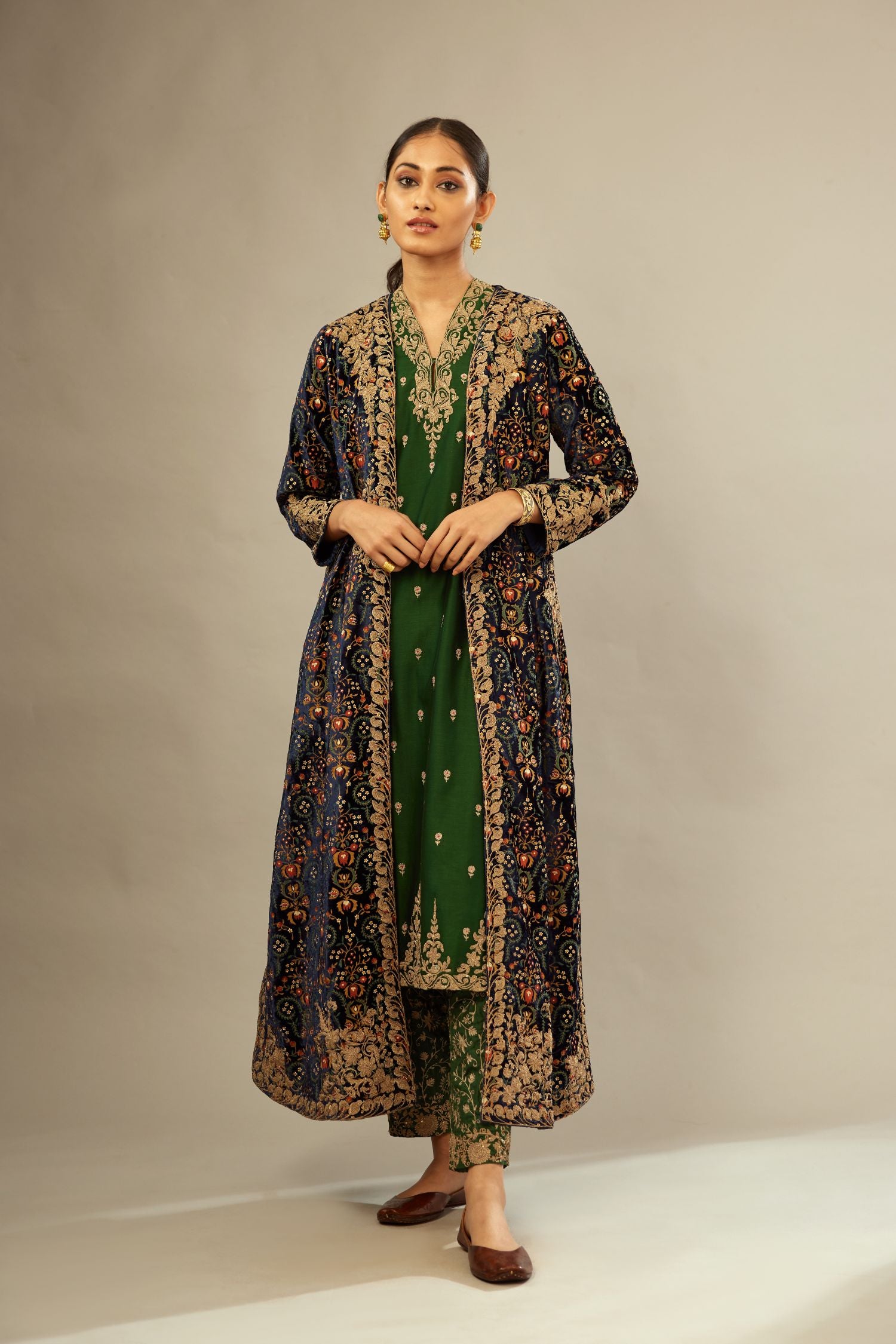 Navy blue silk velvet ankle length front open jacket with fully silk thread jaal embroidery and detailed with light gold dori embroidery.