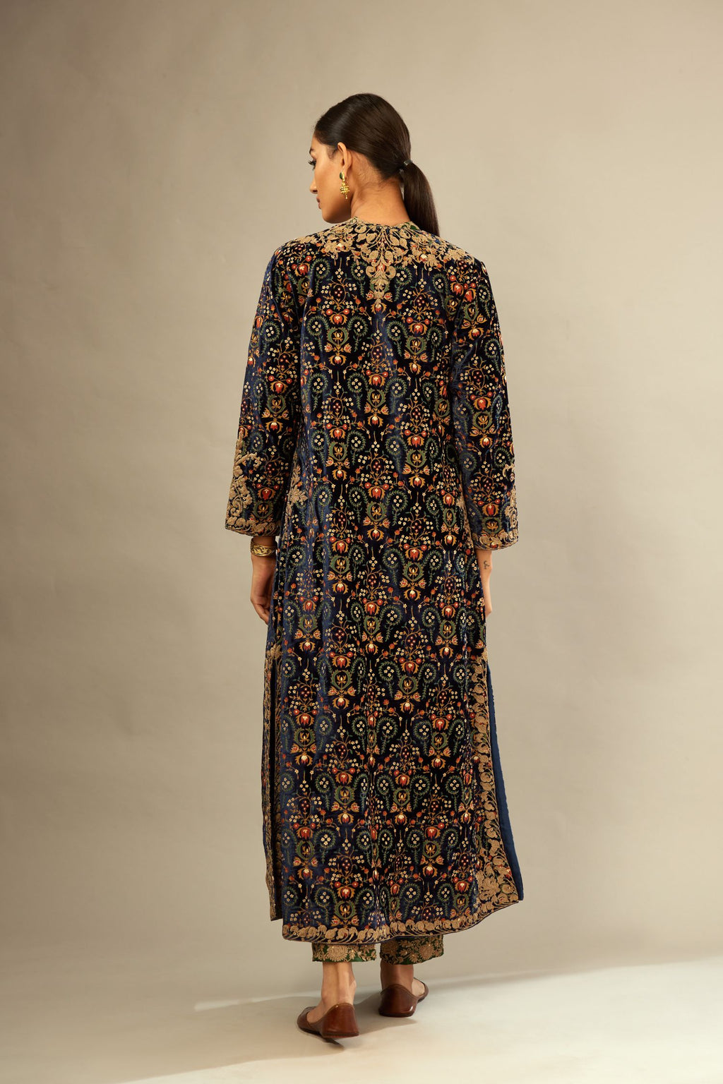 Navy blue silk velvet ankle length front open jacket with fully silk thread jaal embroidery and detailed with light gold dori embroidery.