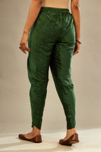 Green silk dhoti with all over small flower embroidery.