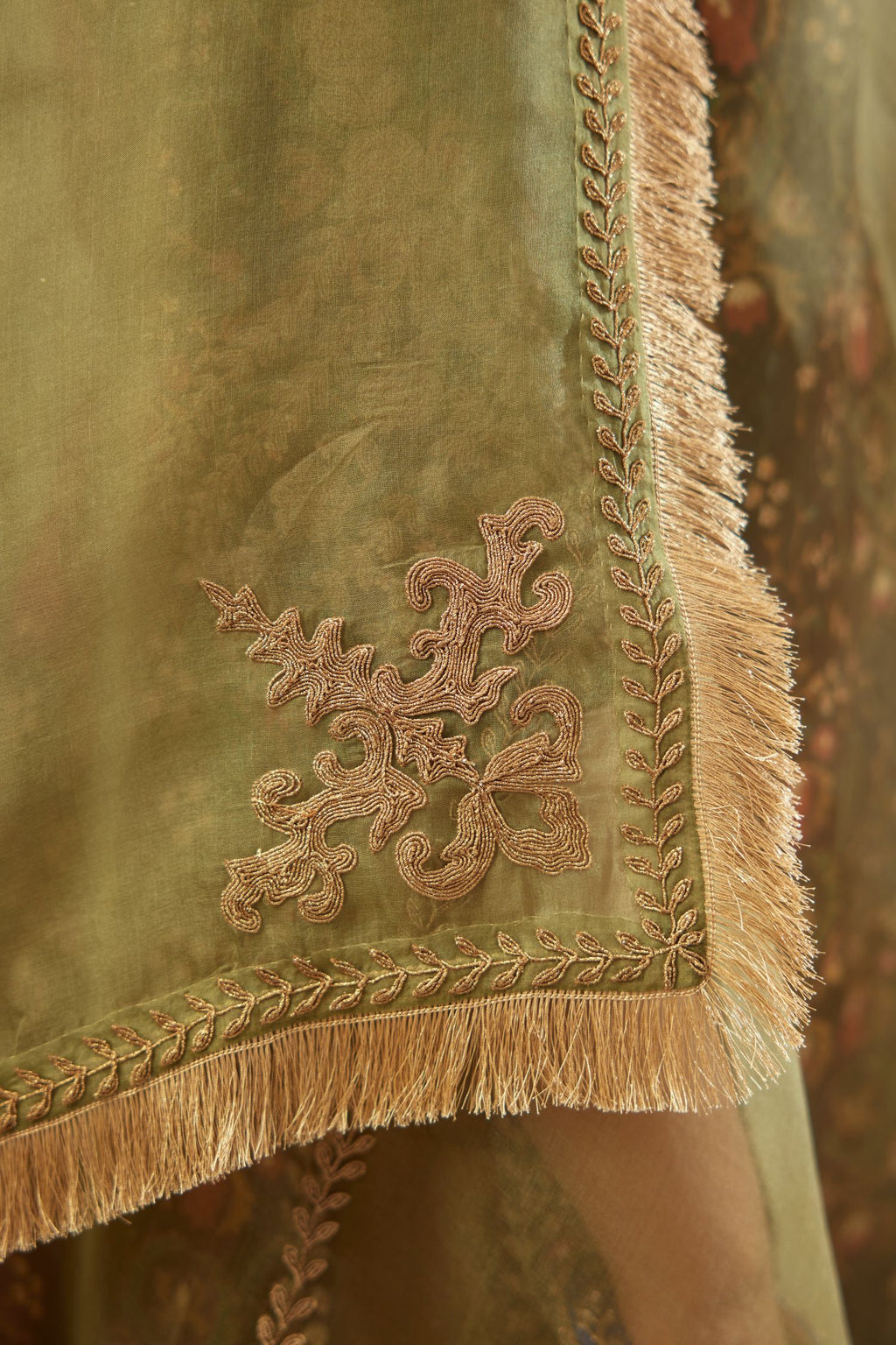Olive silk organza dupatta detailed with all-over light gold dori embroidery.