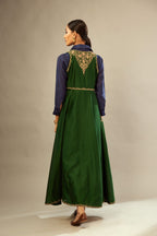 Green long silk chanderi front open sleeveless jacket set with gold dori embroidery detailing, highlighted with gold sequin work.