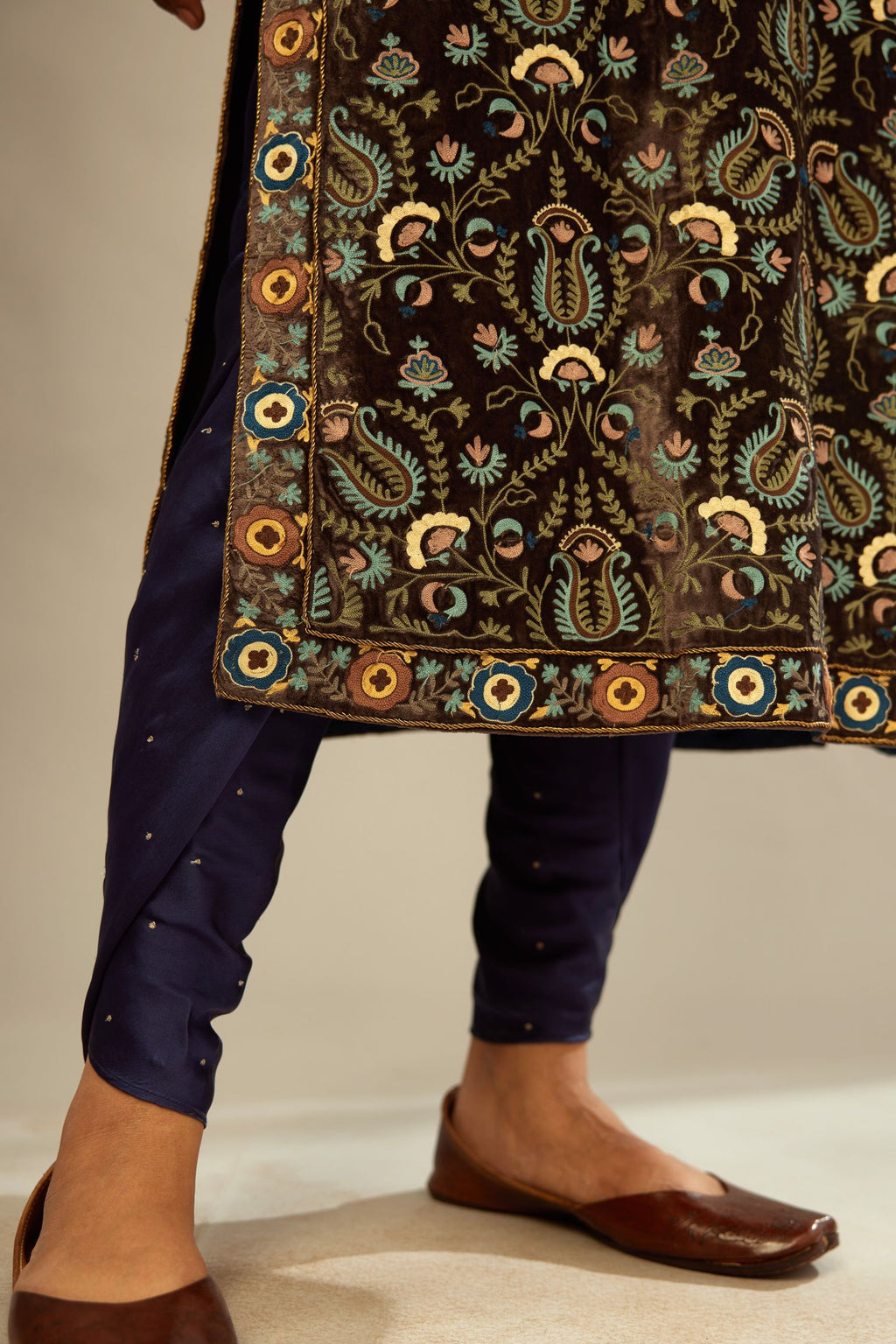 Grey silk velvet straight kurta set with multi colored silk thread jaal embroidery all over it, detailed with single line of zardosi work.