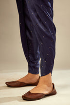 Navy blue silk dhoti with all over small flower embroidery.
