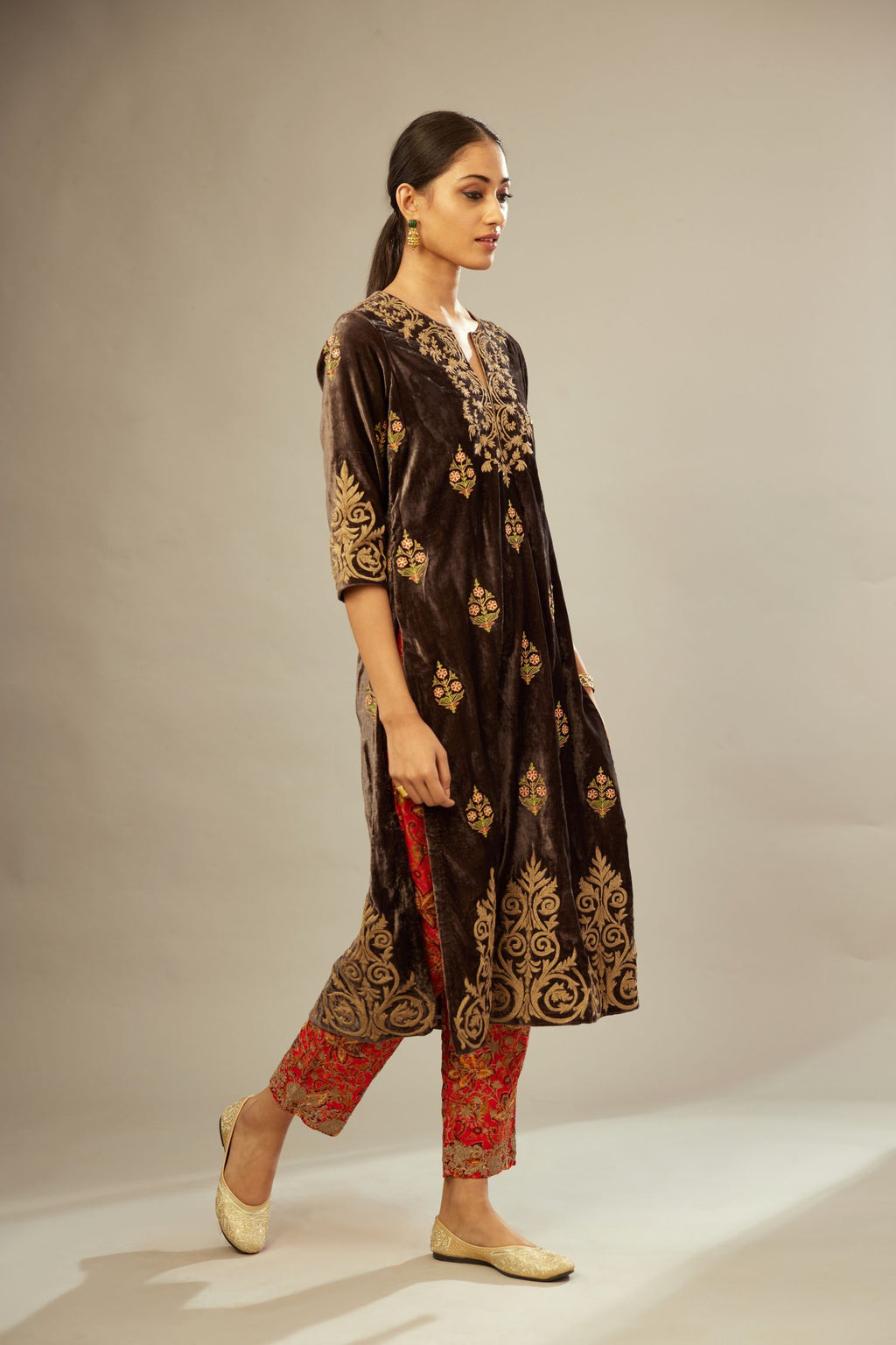 Grey silk velvet lined kurta set with light gold dori embroidery and contrast colored boota all-over the kurta.
