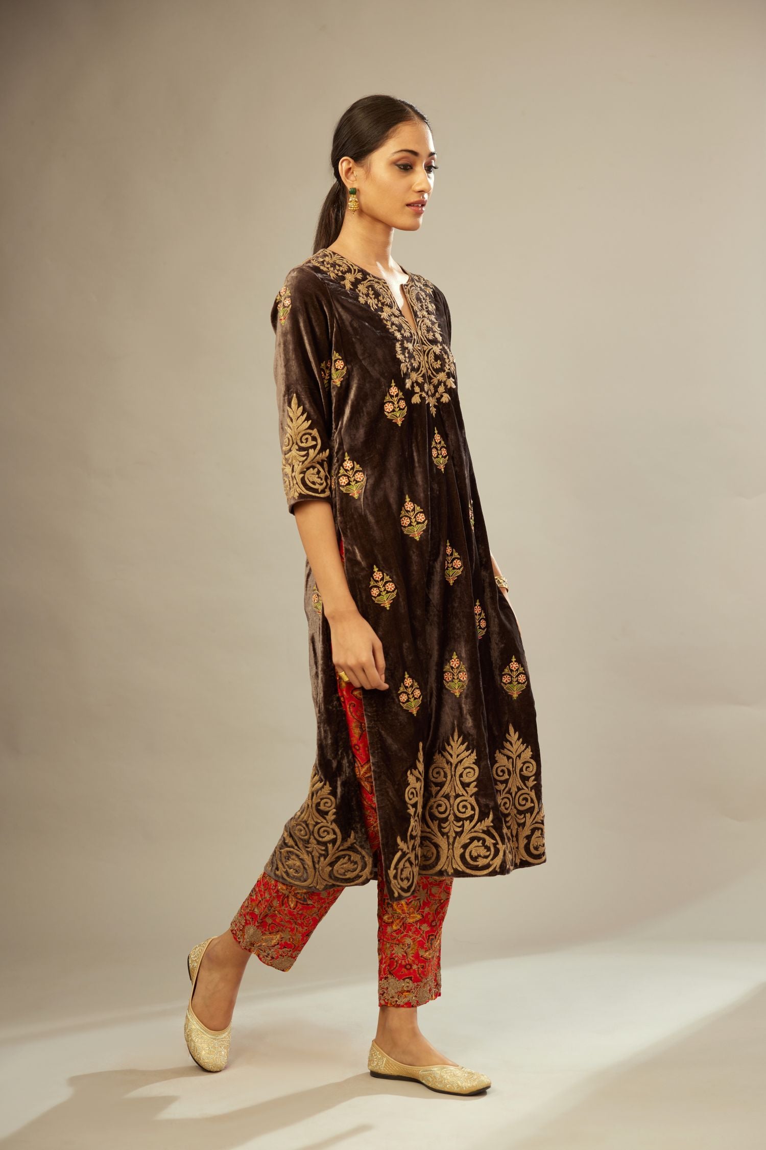 Grey silk velvet lined kurta set with light gold dori embroidery and contrast colored boota all-over the kurta.