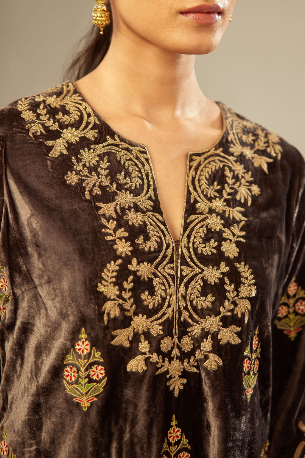 Grey silk velvet lined kurta set with light gold dori embroidery and contrast colored boota all-over the kurta.