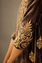 Grey silk velvet lined kurta set with light gold dori embroidery and contrast colored boota all-over the kurta.