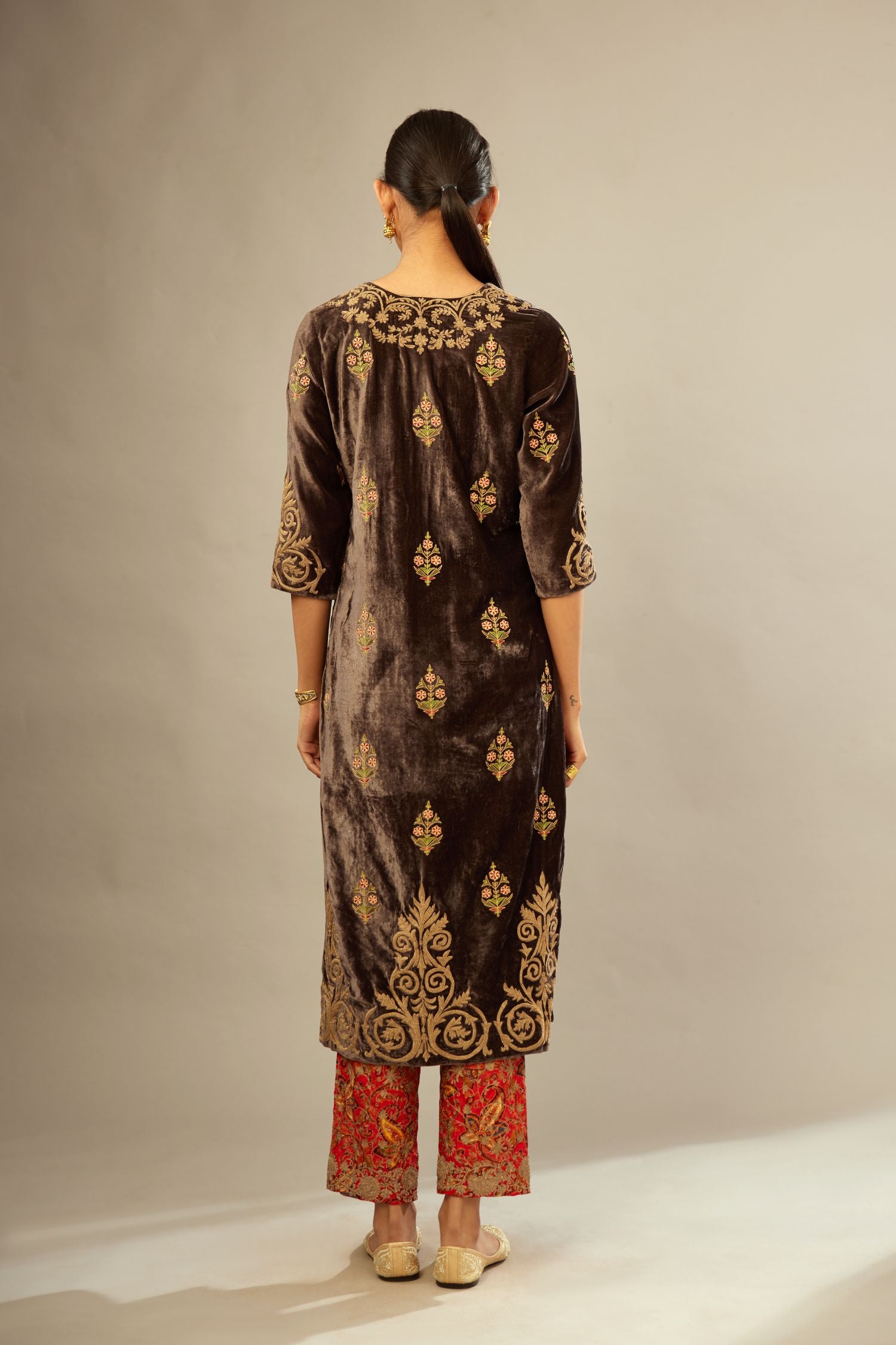 Grey silk velvet lined kurta set with light gold dori embroidery and contrast colored boota all-over the kurta.