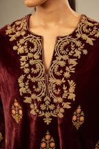 Marron silk velvet lined kurta set with light gold dori embroidery and contrast colored boota all-over the kurta.