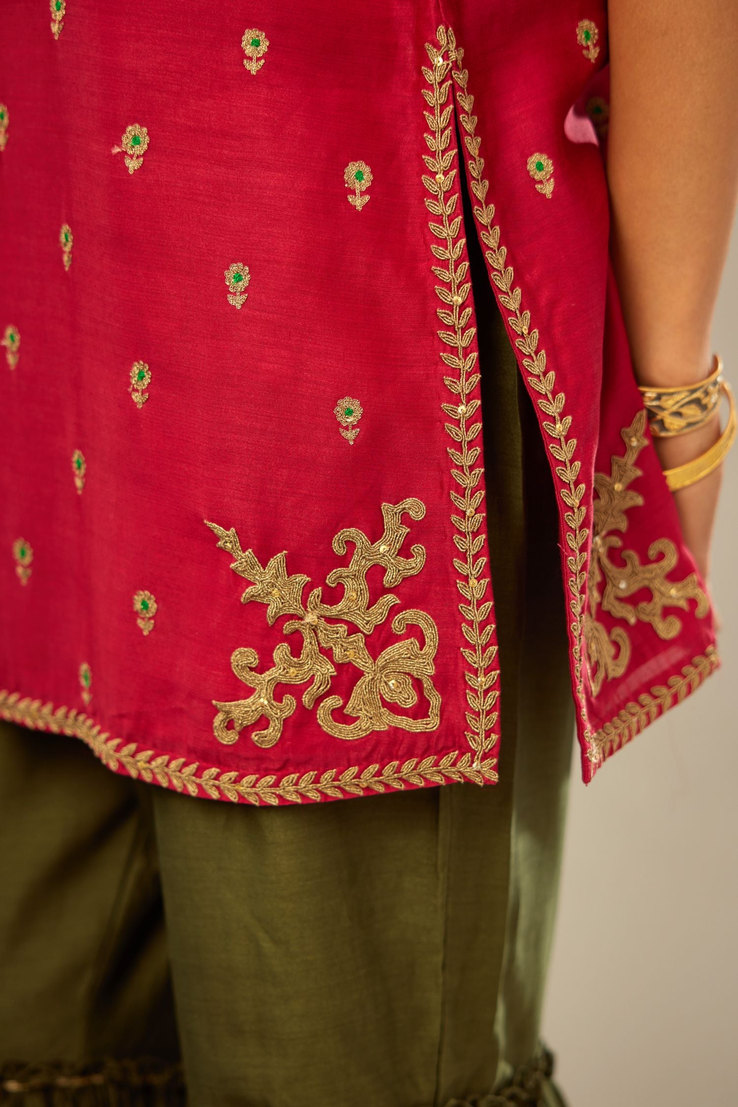 Fuchsia silk chanderi short kurta set with all-over silk thread jaal embroidery, detailed with gold dori embroidery.