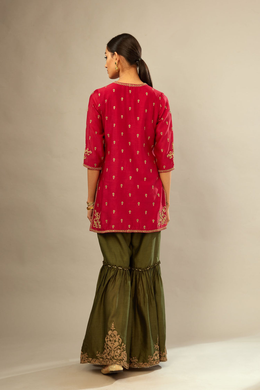 Fuchsia silk chanderi short kurta set with all-over silk thread jaal embroidery, detailed with gold dori embroidery.