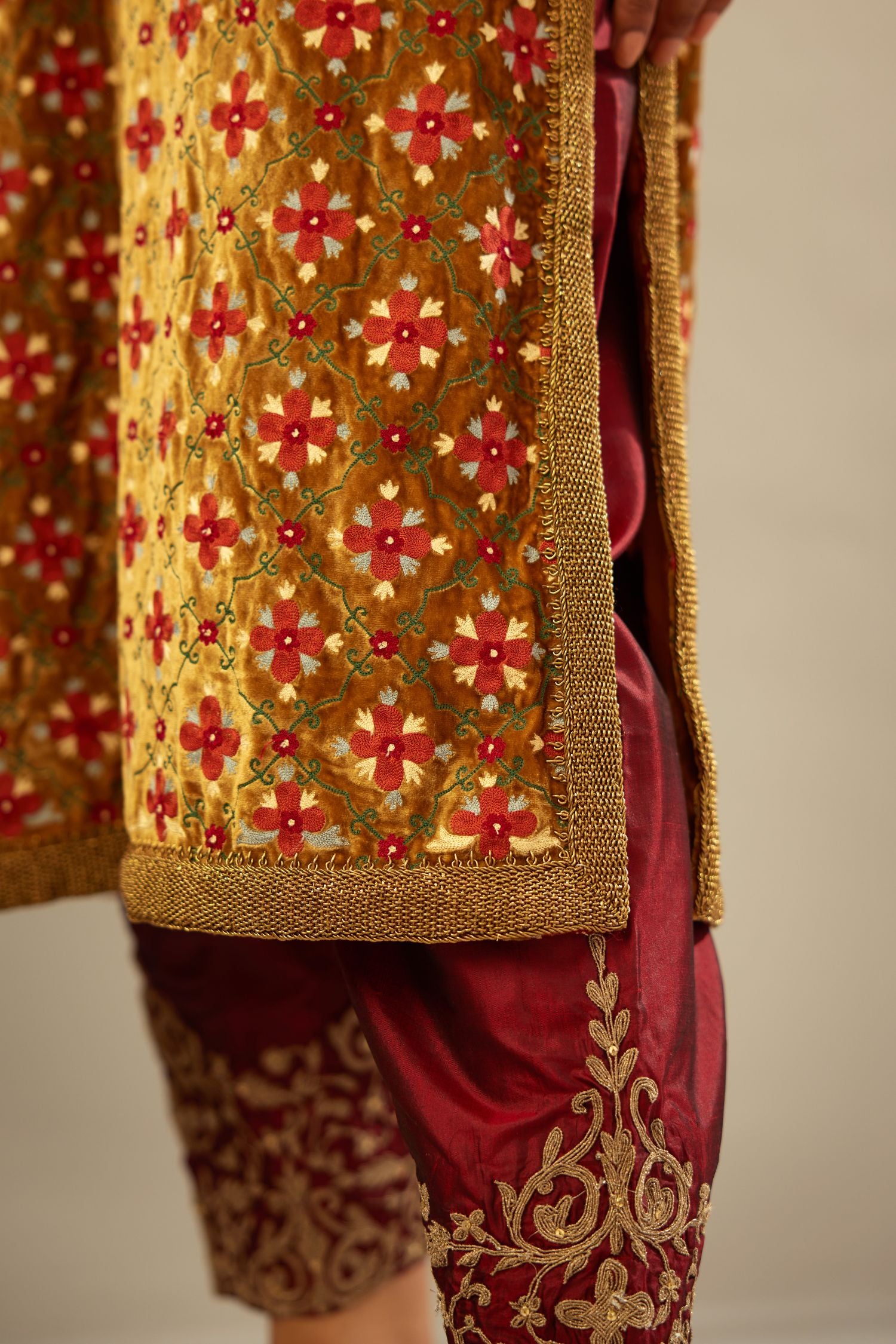 Mustard yellow silk velvet straight kurta set with full jaal silk thread embroidery. This kurta is detailed with zardosi farisha work.