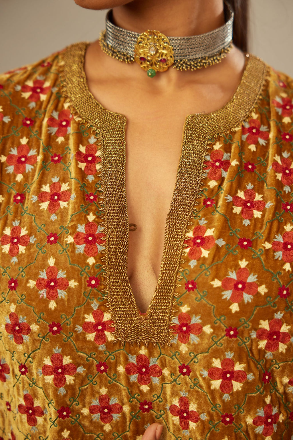 Mustard yellow silk velvet straight kurta set with full jaal silk thread embroidery. This kurta is detailed with zardosi farisha work.