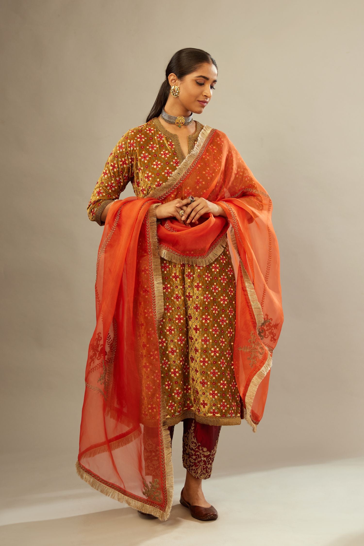Mustard yellow silk velvet straight kurta set with full jaal silk thread embroidery. This kurta is detailed with zardosi farisha work.