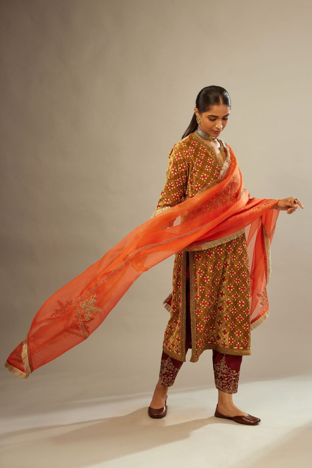 Mustard yellow silk velvet straight kurta set with full jaal silk thread embroidery. This kurta is detailed with zardosi farisha work.