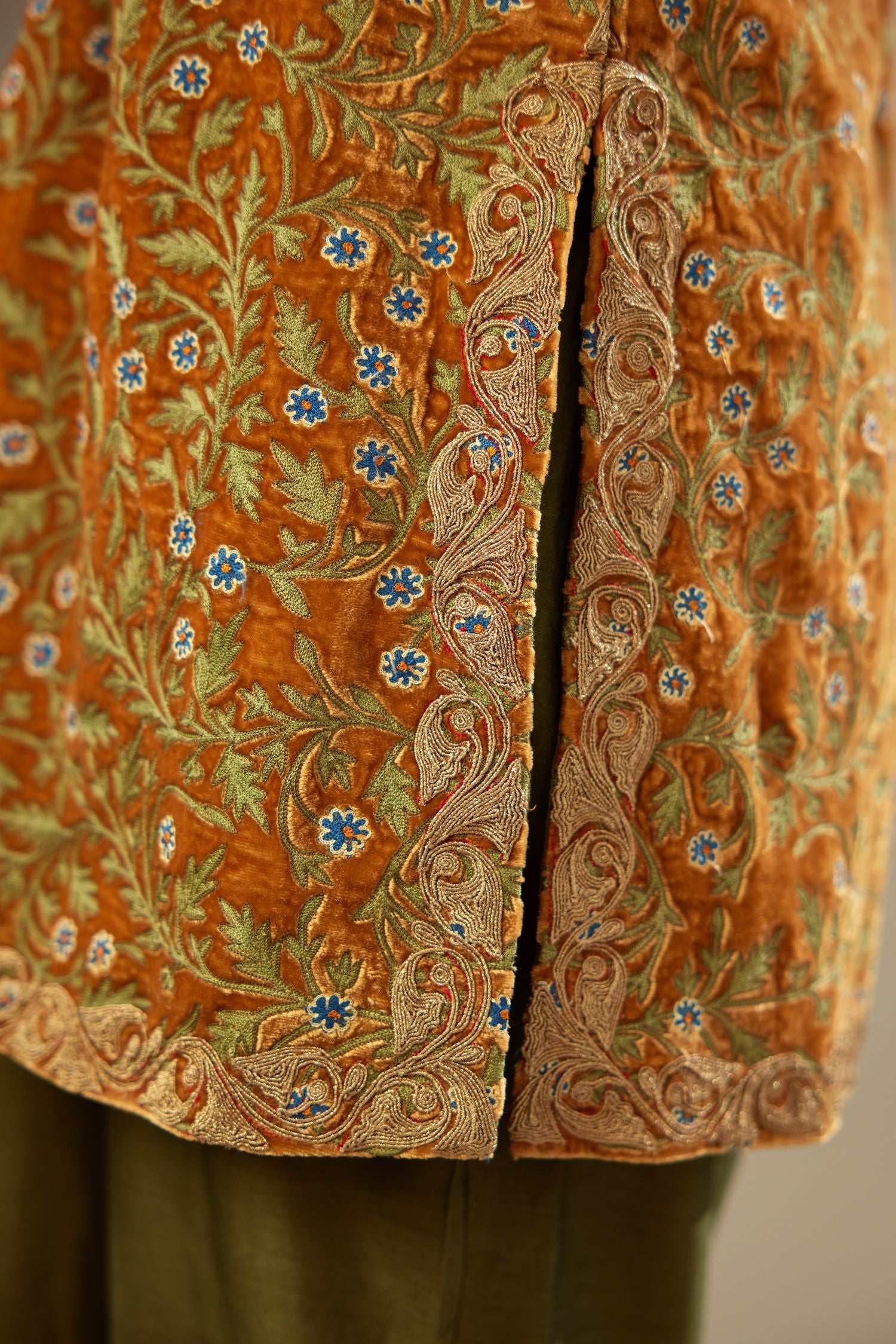 Mustard yellow silk velvet short kurta set with all-over silk thread jaal embroidery, detailed with gold dori embroidery.