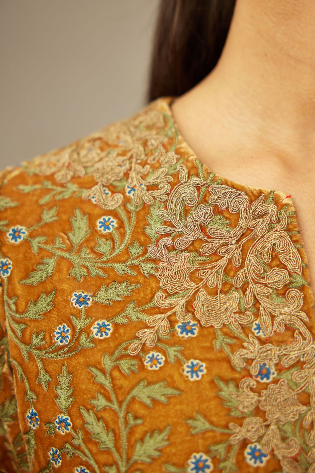 Mustard yellow silk velvet short kurta set with all-over silk thread jaal embroidery, detailed with gold dori embroidery.