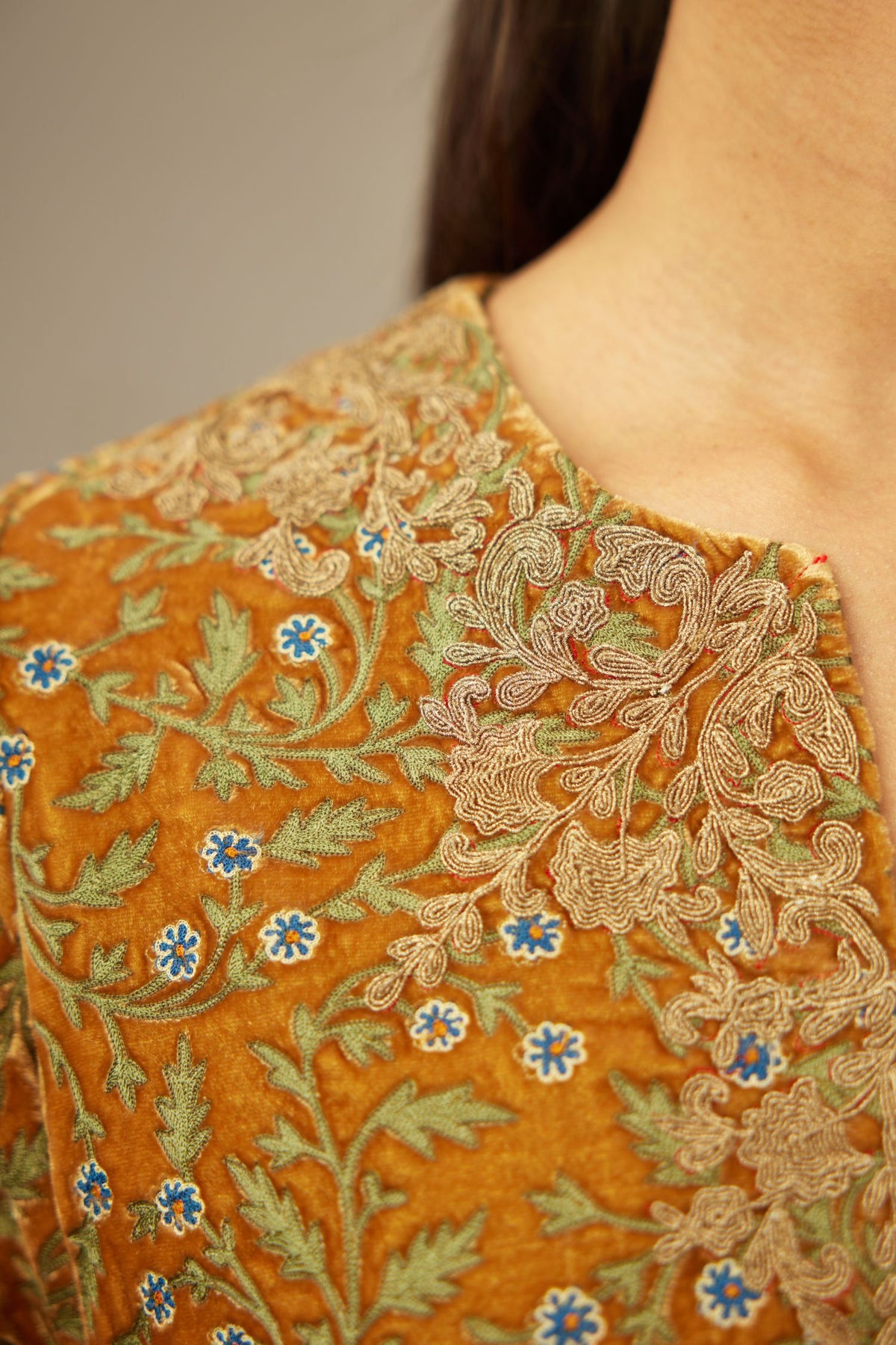 Mustard yellow silk velvet short kurta set with all-over silk thread jaal embroidery, detailed with gold dori embroidery.