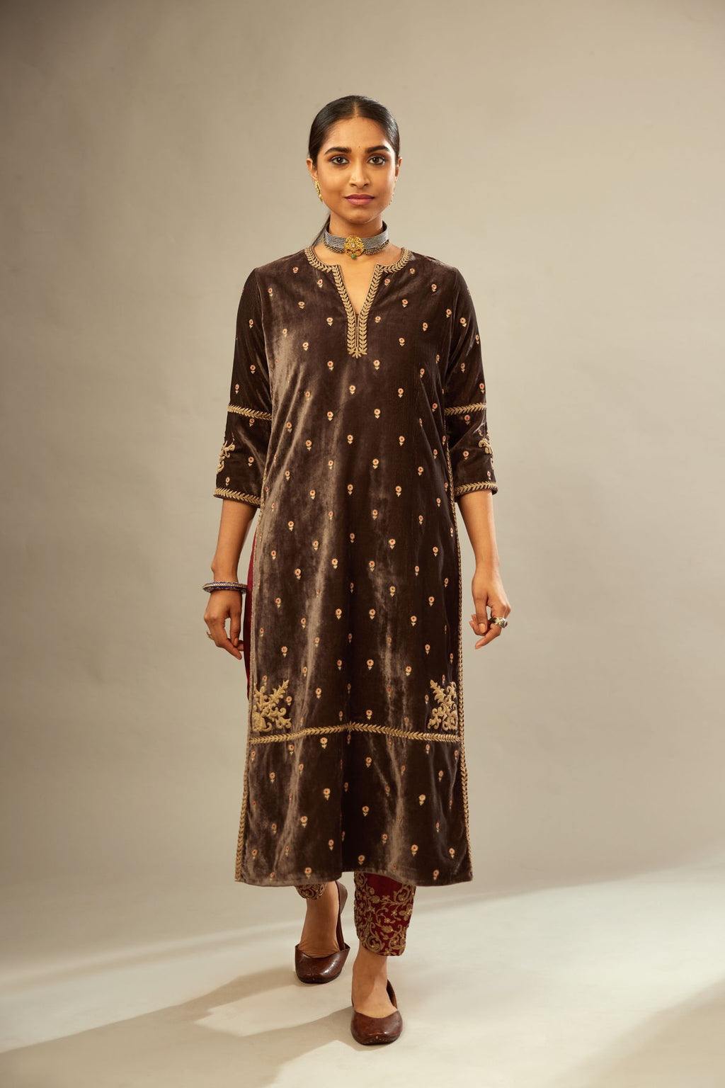 Grey silk velvet straight kurta set with all-over delicate zari embroidered bootis, detailed with dori embroidery border at all edges.