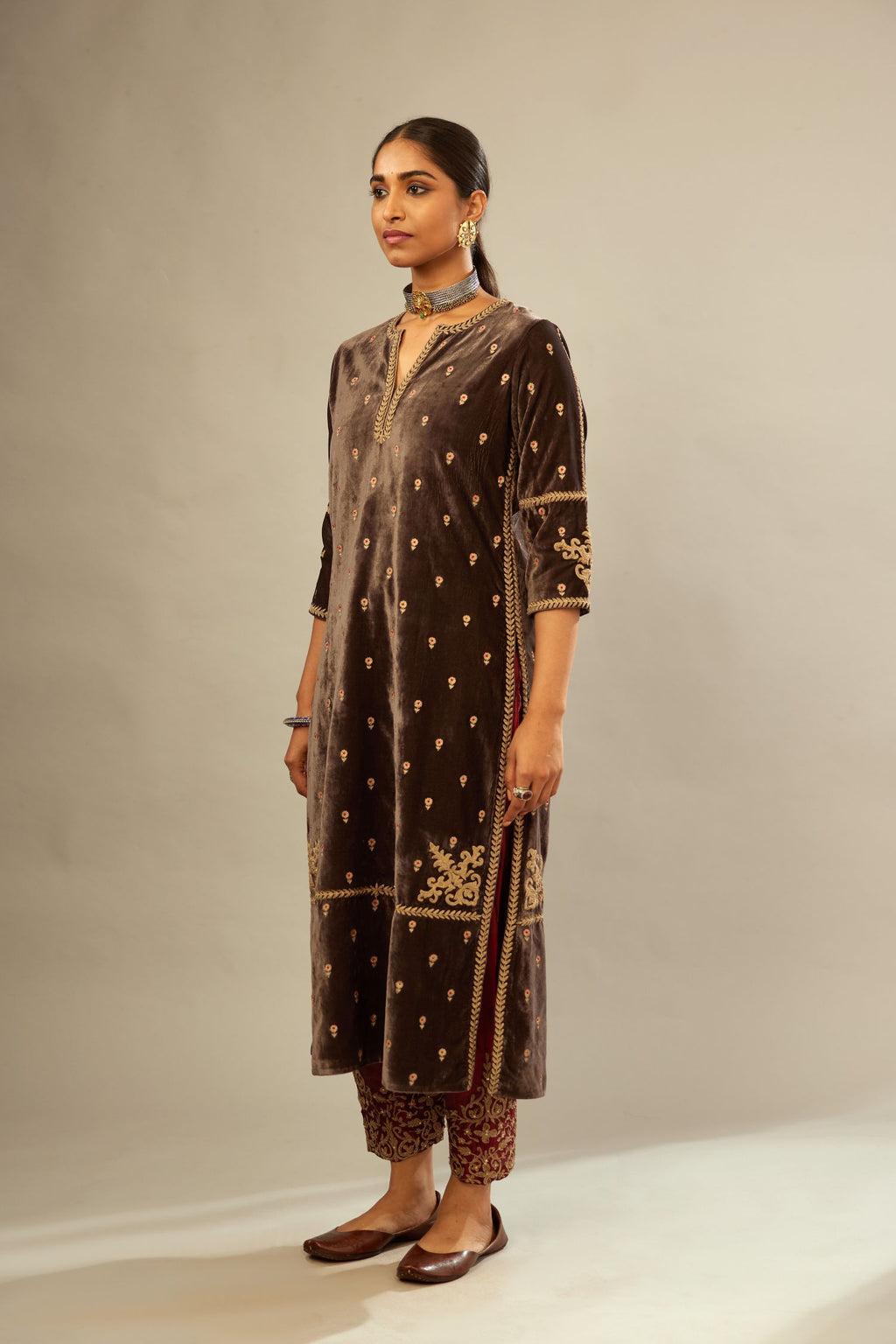 Grey silk velvet straight kurta set with all-over delicate zari embroidered bootis, detailed with dori embroidery border at all edges.