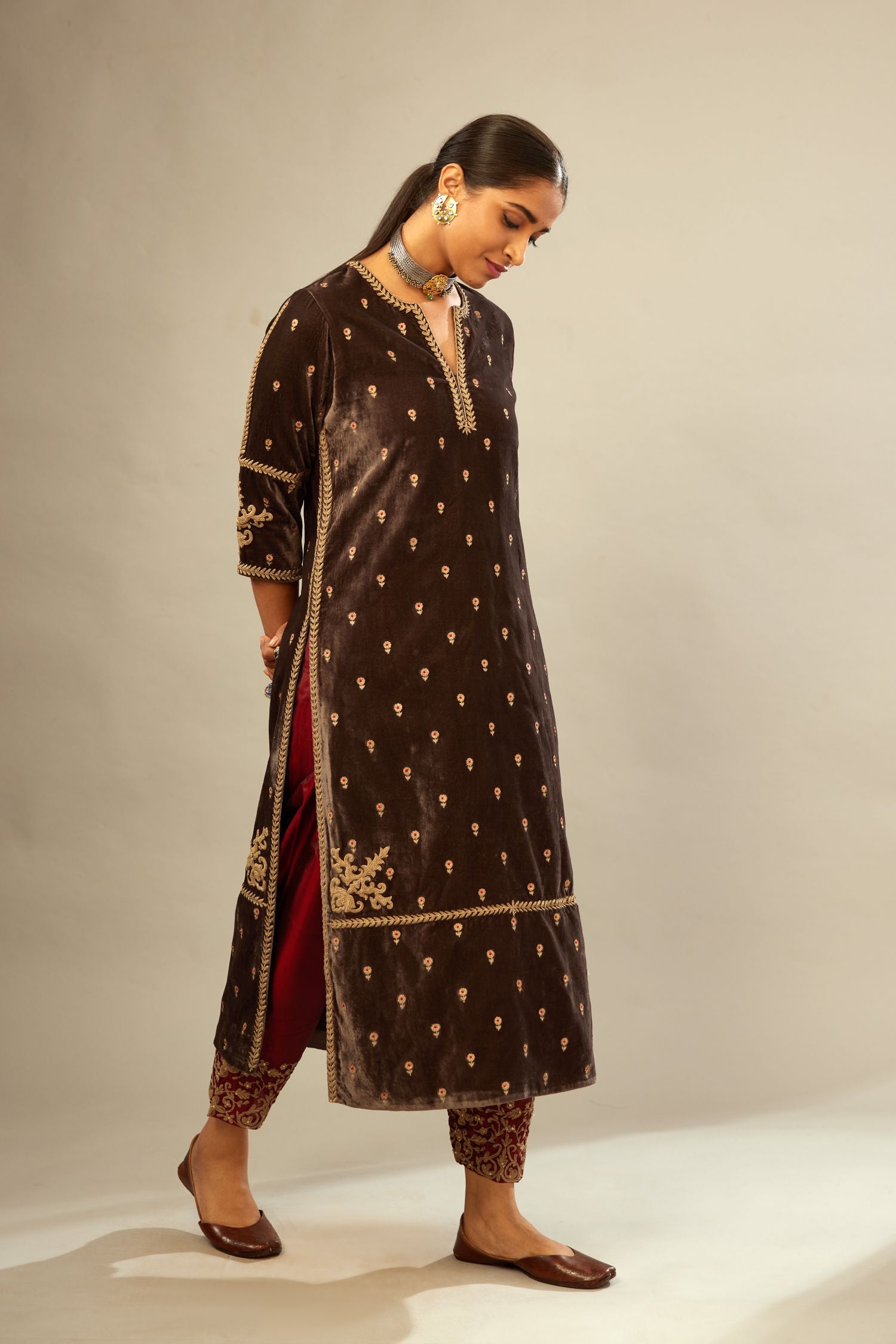 Grey silk velvet straight kurta set with all-over delicate zari embroidered bootis, detailed with dori embroidery border at all edges.