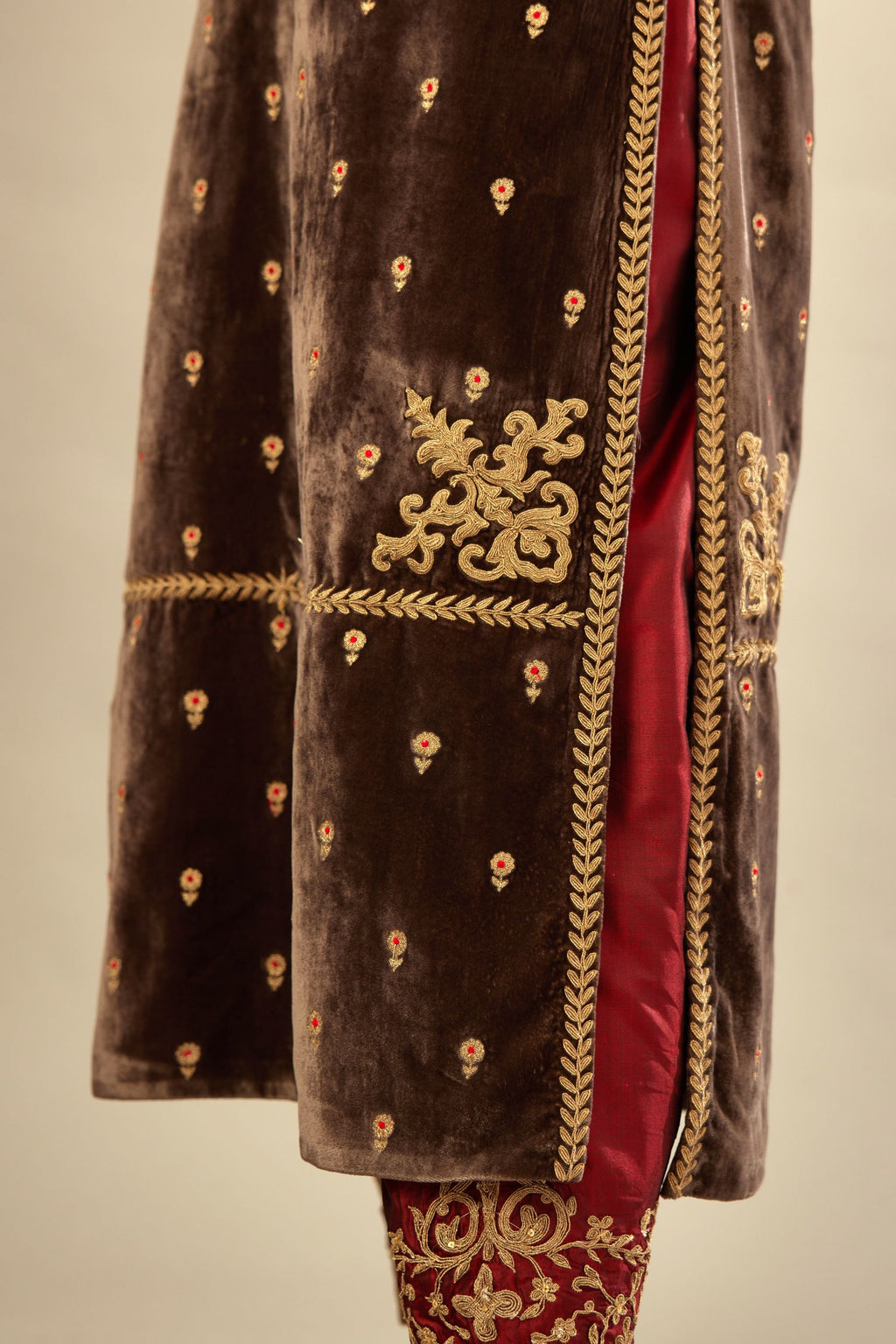 Grey silk velvet straight kurta set with all-over delicate zari embroidered bootis, detailed with dori embroidery border at all edges.
