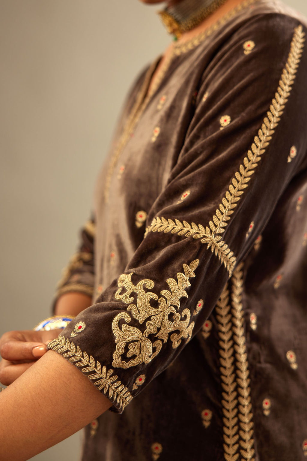 Grey silk velvet straight kurta set with all-over delicate zari embroidered bootis, detailed with dori embroidery border at all edges.