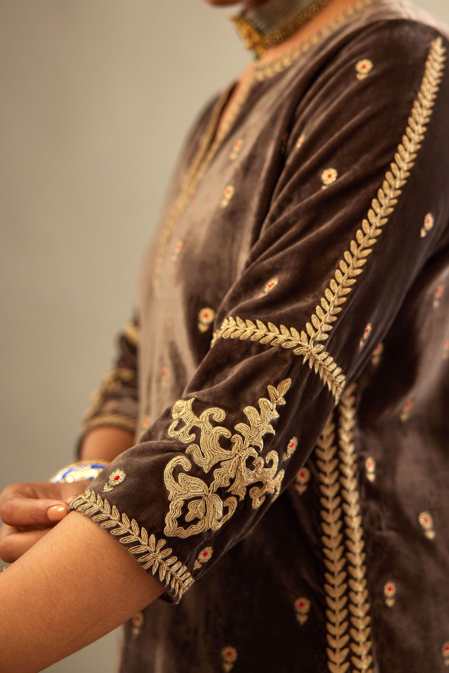 Grey silk velvet straight kurta set with all-over delicate zari embroidered bootis, detailed with dori embroidery border at all edges.