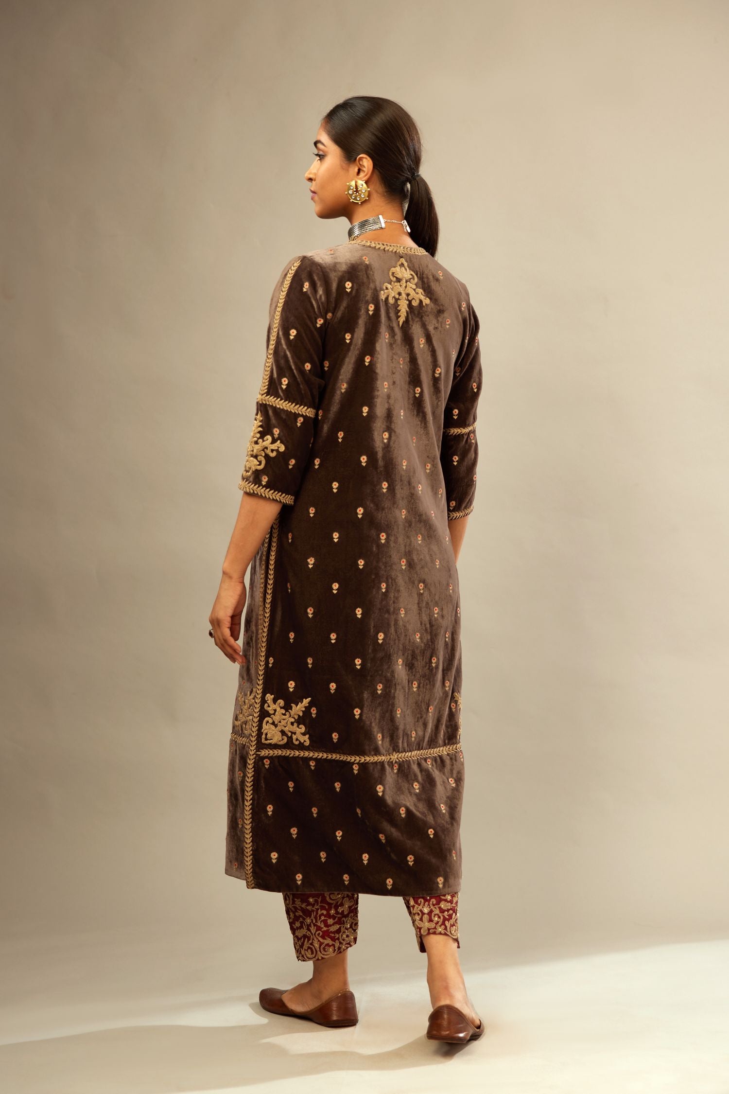 Grey silk velvet straight kurta set with all-over delicate zari embroidered bootis, detailed with dori embroidery border at all edges.