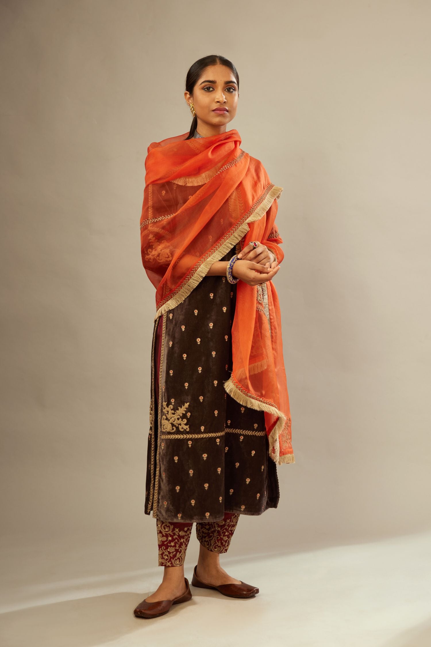 Grey silk velvet straight kurta set with all-over delicate zari embroidered bootis, detailed with dori embroidery border at all edges.