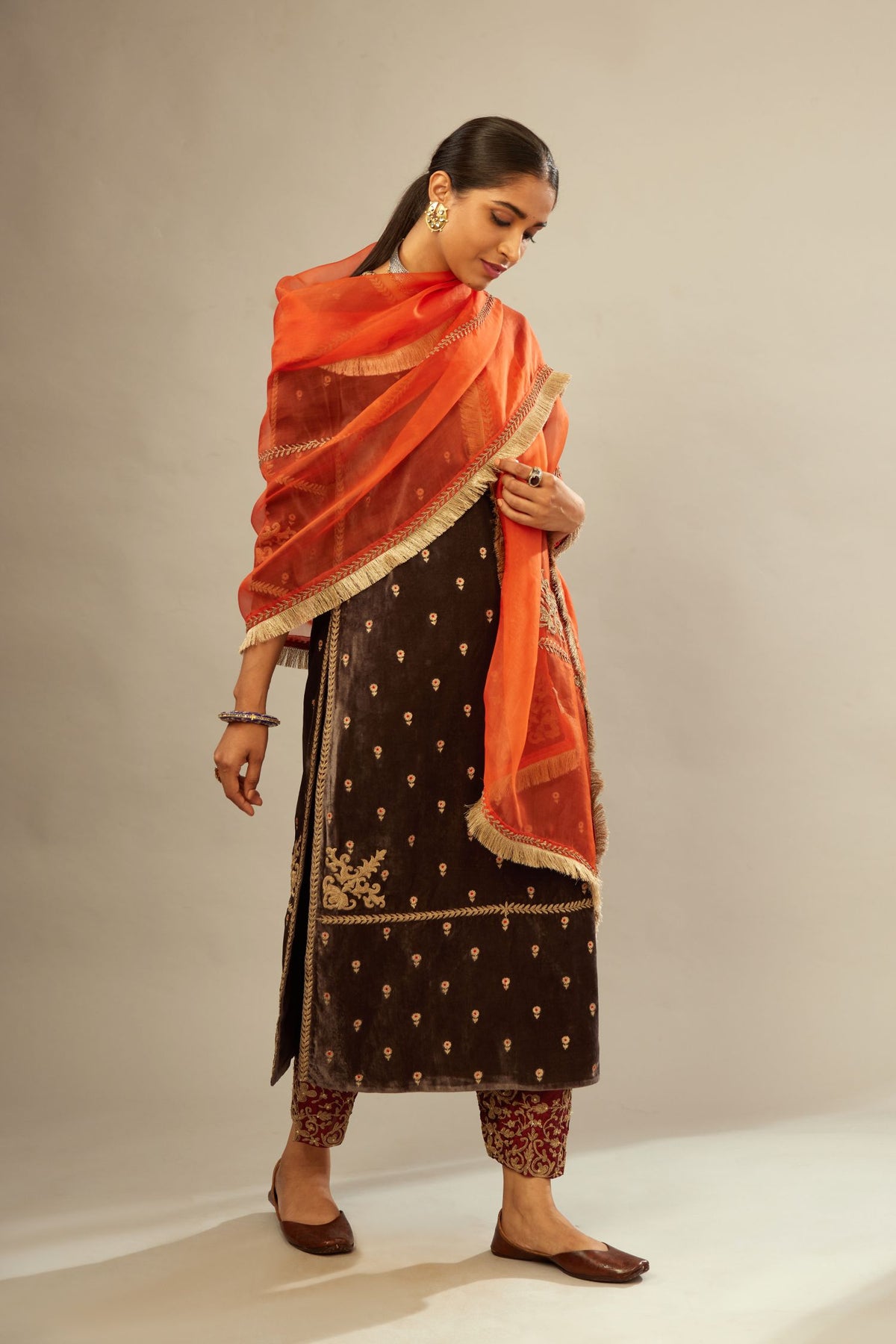Grey silk velvet straight kurta set with all-over delicate zari embroidered bootis, detailed with dori embroidery border at all edges.